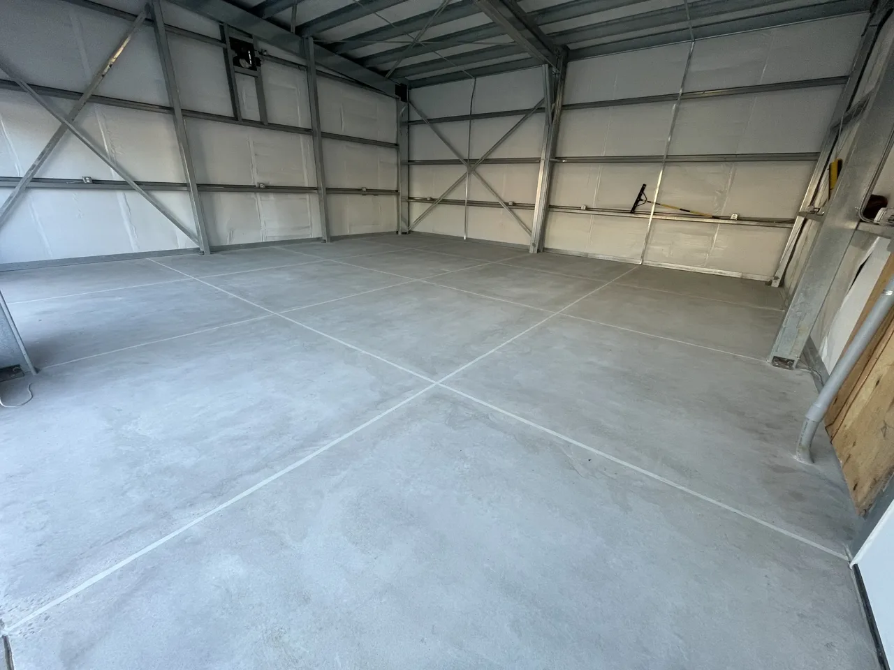 Uncoated concrete floor and joint detail before a floor finish